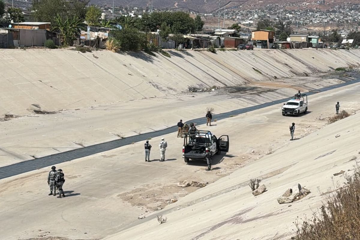 Encuentran cuerpo con huellas de violencia sobre una bicicleta de carga en el Río Alamar de Tijuana