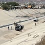 Encuentran cuerpo con huellas de violencia sobre una bicicleta de carga en el Río Alamar de Tijuana