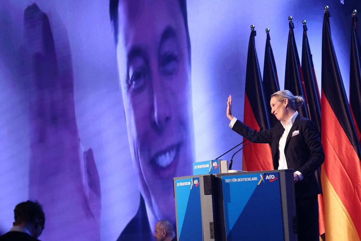 Alternative for Germany (AfD) party and faction co-chairwoman and top candidate for the federal election Alice Weidel talks online to Elon Musk during her speech during election campaign launch in Halle, Germany, 25 January 2025