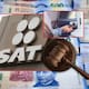 El SAT detectó más de 17 mil depósitos y 55 mil retiros por casi 10 mil millones de pesos en empresas sin autorización financiera y ahora la FGR busca imputar a seis personas por lavado de dinero