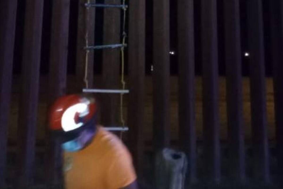 Migrante muere al caer del muro fronterizo