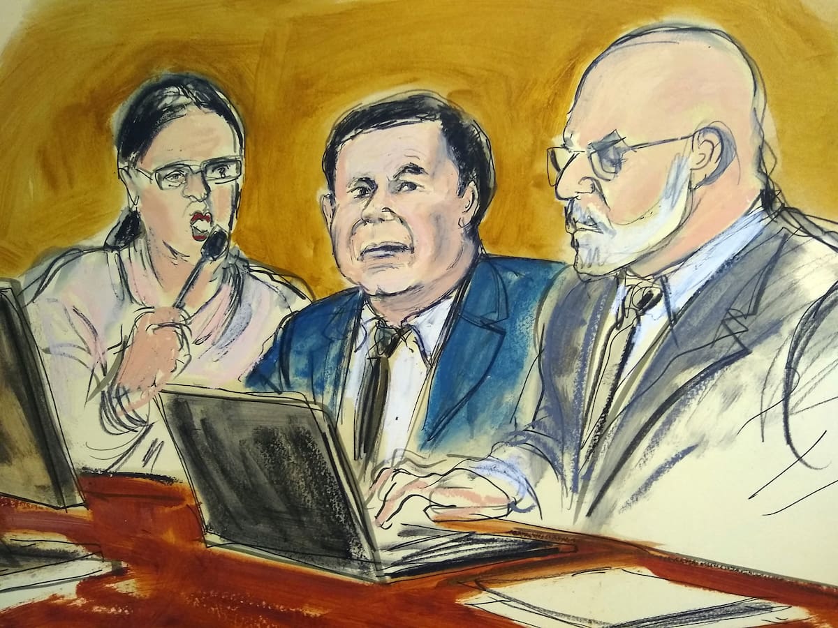 In this courtroom drawing, Joaquin "El Chapo" Guzman, center, sits at the defense table while listening to Judge Brian Cogan addressing the jury, Thursday, Feb. 7, 2019, during Guzman's drug trafficking trial in New York. Jurors ended their first week of deliberations on Thursday without reaching a verdict. From left are an interpreter, Guzman and defense attorney Eduardo Balarezo.(Elizabeth Williams via AP)