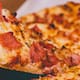 Alerta sanitaria por pizzas congeladas elaboradas con leche en polvo que podrían estar contaminadas con Salmonella y representar riesgo de infecciones graves en menores y adultos