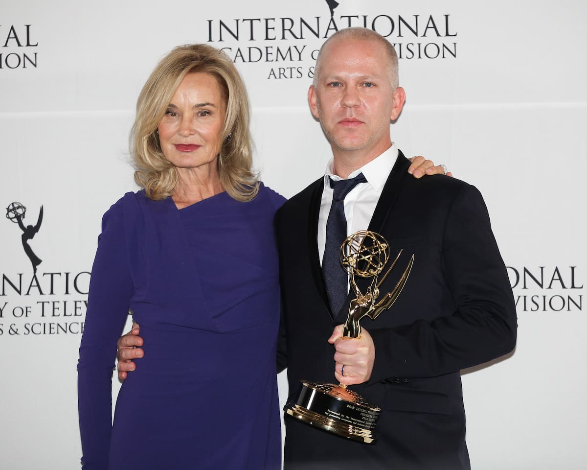 This Nov. 19, 2012 photo released by Starpix shows Ryan Murphy, right, with presenter Jessica Lange after winning the Founders Award at the 40th International Emmy Awards in New York. Lange stars in Murphy's series, "American Horror Story." (AP Photo/Starpix, Andrew Toth)