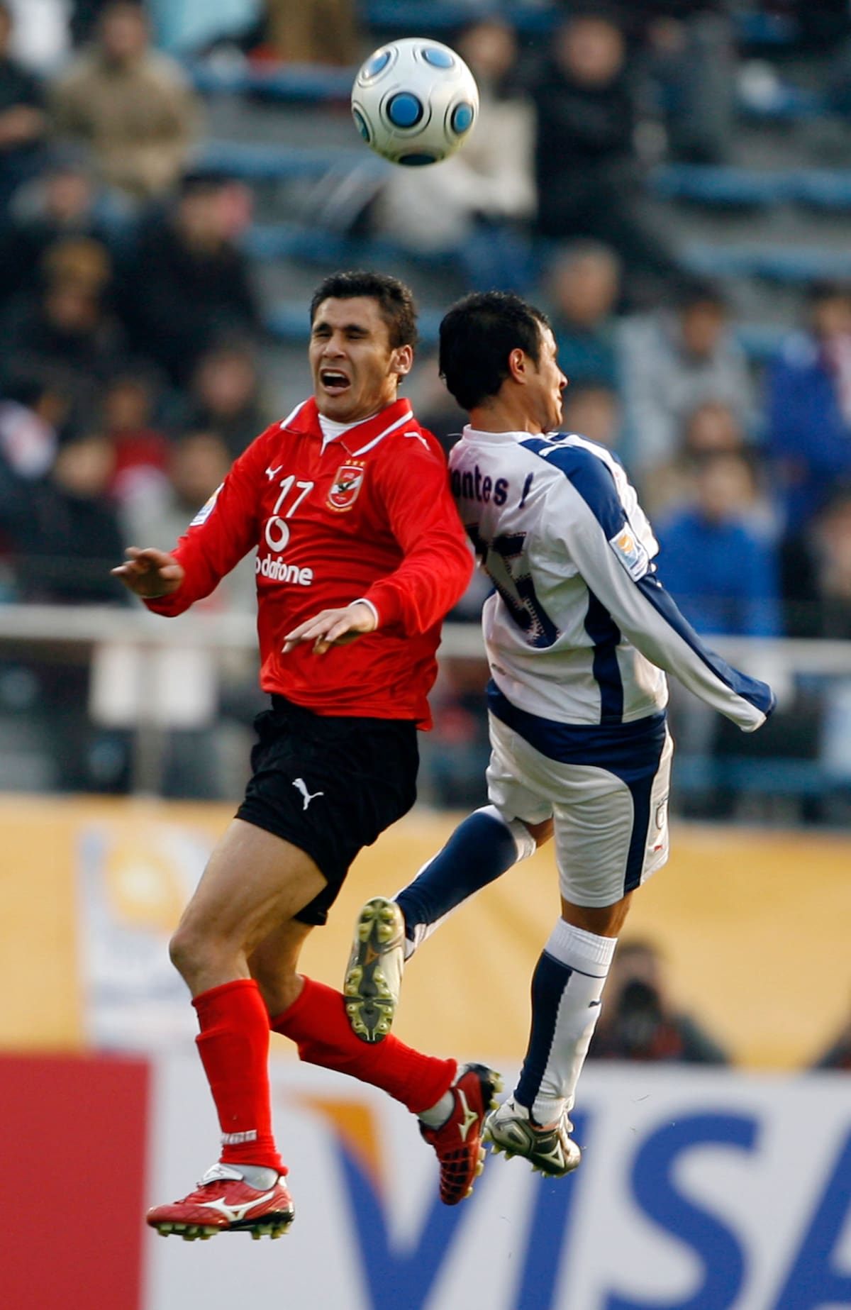 Luis Montes of Mexico's Pachuca C.F., right, and Ahmed Hassan of Egypt's Al Ahly go for a header during the FIFA Club World Cup Japan 2008 in Tokyo, Japan, Saturday, Dec. 13, 2008. (AP Photo/Junji Kurokawa)