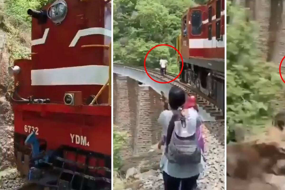 Pareja salta de puente para no ser atropellados por un tren mientras se tomaban su fotografía de boda