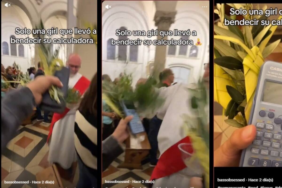 Joven lleva a bendecir su calculadora en la misa de domingo de ramos