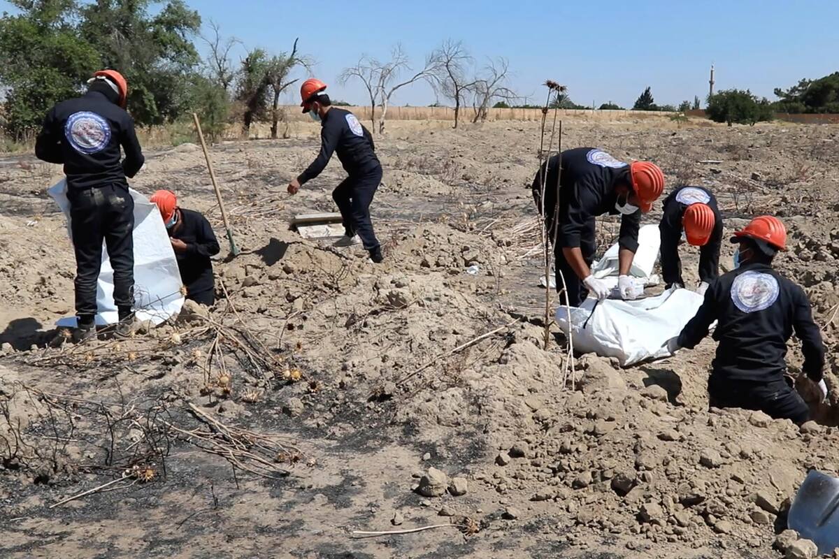 Van 313 cadáveres retirados de fosa común en Siria