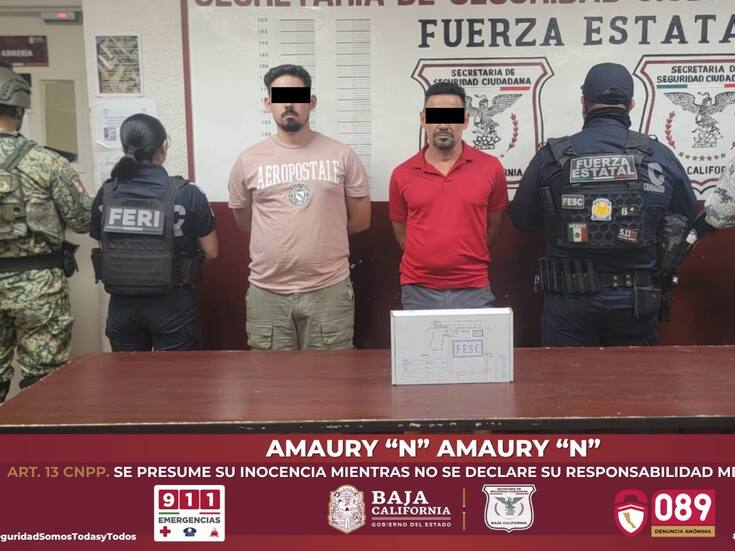 Sujetos originarios de Cuba detenidos con arma de fuego en plaza comercial