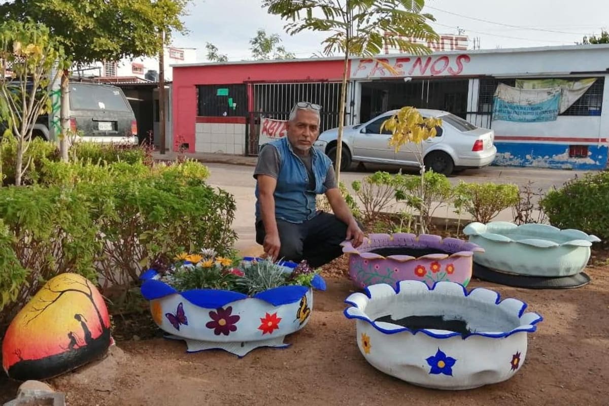 Rafael convierte neumáticos usados en maceteros
