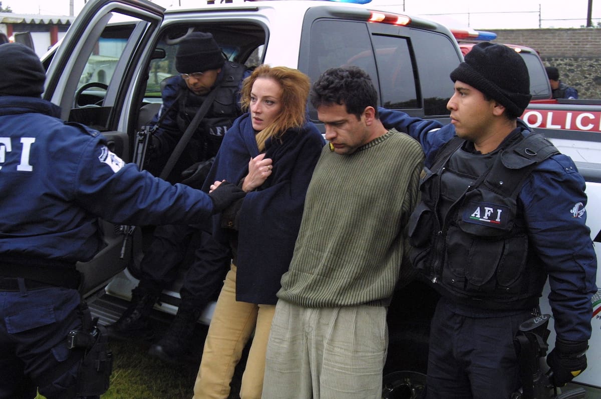 In this Dec. 9, 2005 photo French citizen Florence Cassez, left, and her boyfriend Israel Vallarta are shown to the press during a re-staging for the media of her actual arrest that took place days earlier on the outskirts of Mexico City. President Calderon announced on national television on Monday June 22, 2009 that Cassez, who is convicted of kidnapping, will have to serve her 60-year sentence in Mexico, rejecting appeals by France to send her home.(AP Photo)