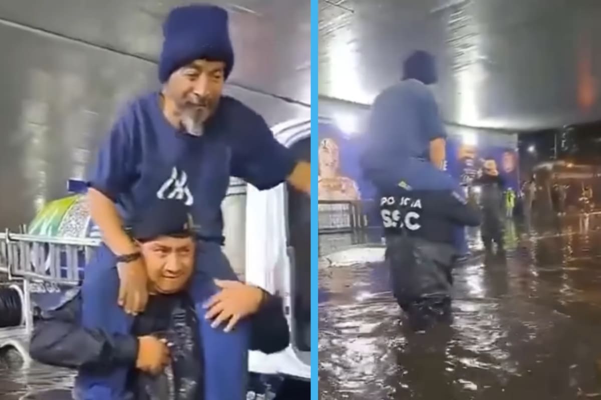 Policía de la CDMX carga en hombros a conductor de pipa atrapado en inundación de Tlalpan