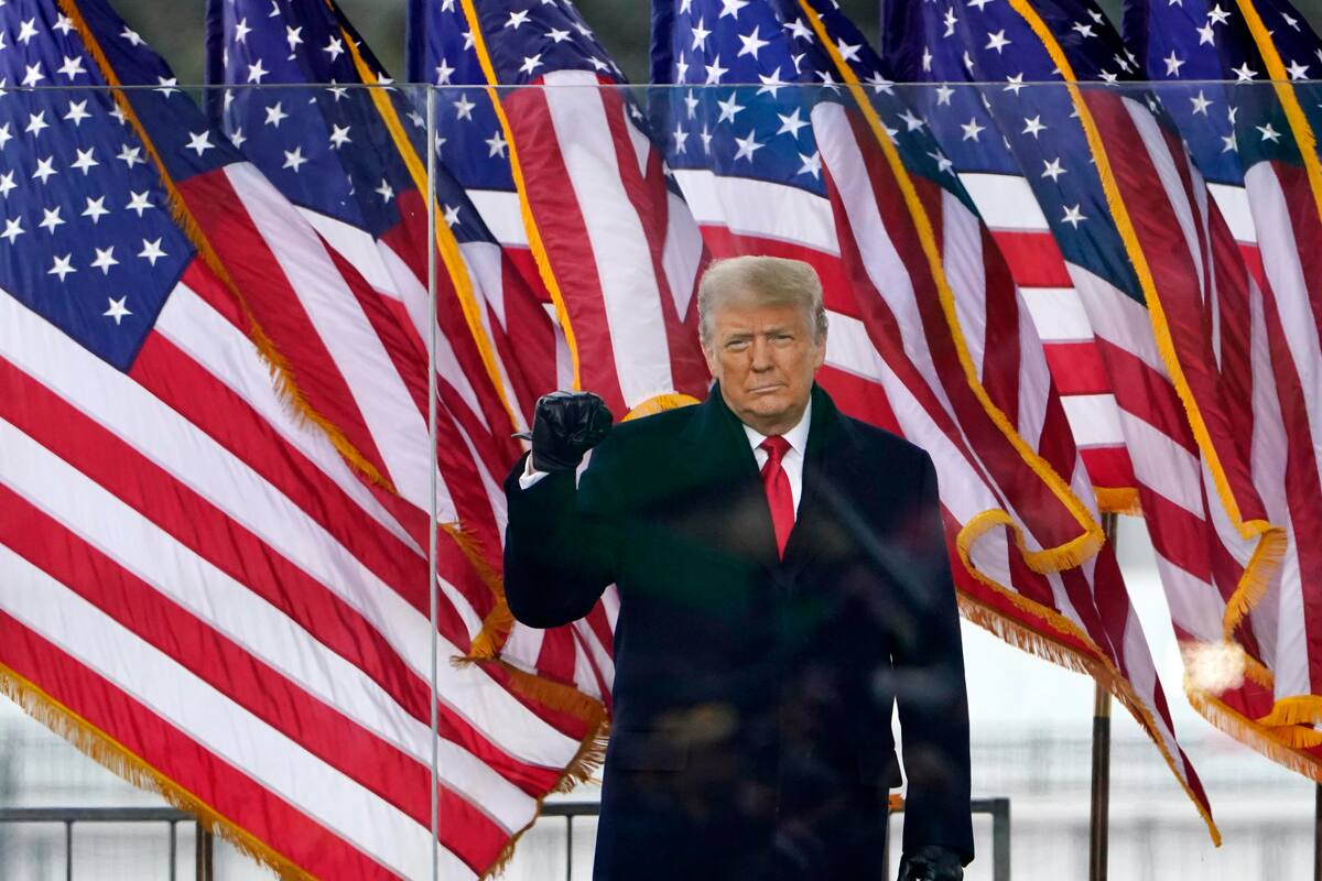 El presidente Donald Trump llega a dar un discurso a un mitin en su apoyo, el miércoles 6 de enero de 2021, en Washington. (AP Foto/Jacquelyn Martin) SPANDCJM460