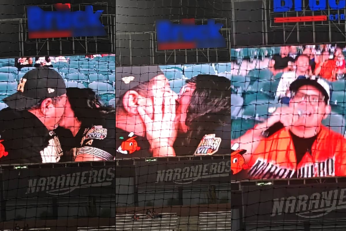 Pareja se hace viral por atrevido y largo beso en la Kiss Cam del Estadio Fernando Valenzuela… y se ganan una coyota