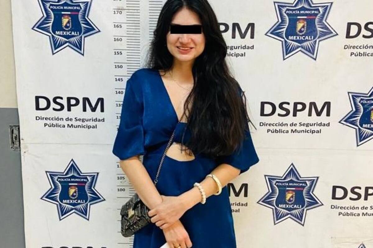 Mujer muerde a policía en comandancia