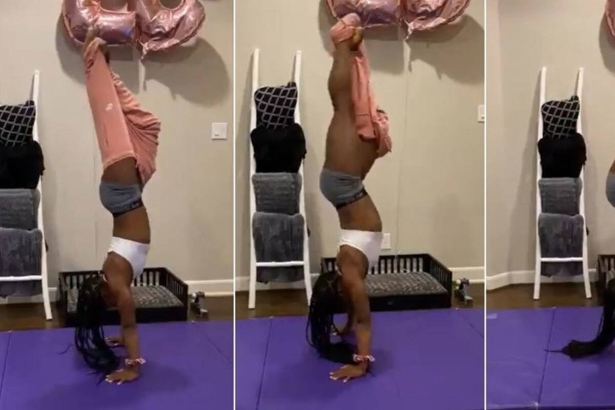 Gimnasta se quita los pantalones parada de manos desafiando la gravedad