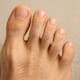 Tener muchos vellos en los dedos de los pies o pocos pueden indicarte si tienes algún problema de salud