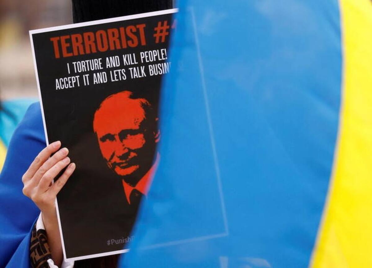 Foto de archivo de un cartel cin el rostro de Putin en una manifestación en Malta 
 Mar 12, 2022. REUTERS/Darrin Zammit Lupi