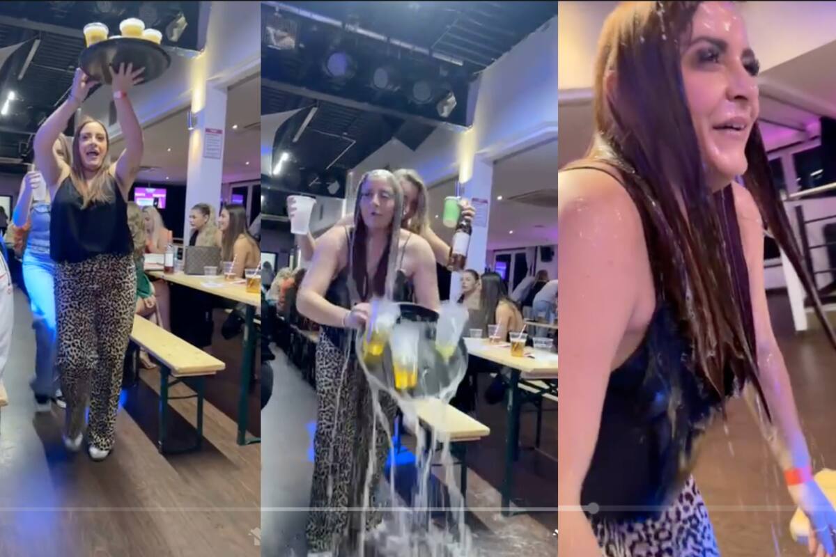 Mujer termina BAÑADA de cerveza por perder el equilibrio al cargar las bebidas sobre un plato