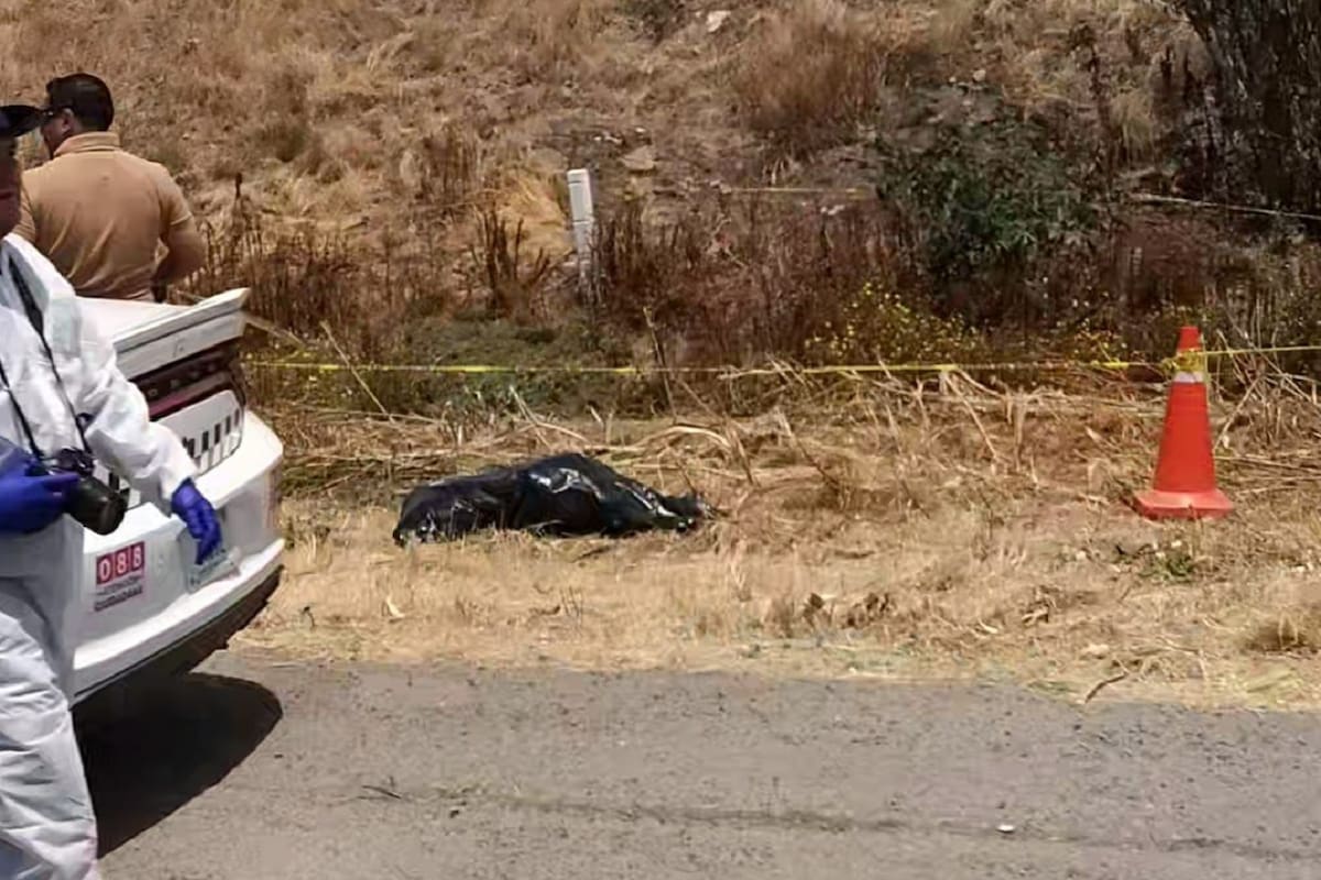 Localizan cuerpo de mujer en bolsa negra en Escénica