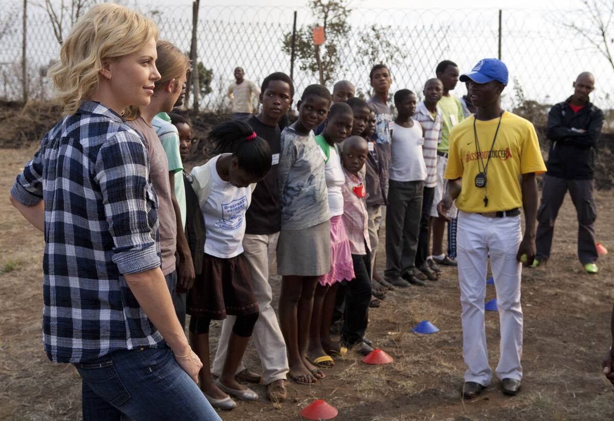 HIGHER RATES, NO TABLOIDS, NEEDS PUBLICIST APPROVAL
** Publicist Approval Needed **
MTUBATUBA, KWAZULU NATAL, SOUTH AFRICA: Actress Charlize Theron and soccer stars Mia Hamm and Lorrie Fair visit Charlize's Mpilonhle project in Mtubatuba on the North Coast of Natal, South Africa on July 8 2010. The Mpilonhle project, which means "A Good Life" in the local dialect, is focused on improving the lives of adolescents through the prevention of HIV combining education and awareness with sport and counseling as well as providing computer training for social and employment skills. The project utilizes a number of mobile units which are trucked from school to school all over the area. These units consist of mobile computer classrooms, voluntary HIV screening rooms, counseling facilities and education facilities focused on general health for children and young adults. There is also a multi-layered sports program which used soccer as a metaphor through which to talk about Aids. These mobile units are fully staffed and if any person is in need of medical care there is a full time nurse to attend to them
Charlize Theron, Self Assignment, July 8-9, 2010
MTUBATUBA, South Africa
July 8, 2010
Photo by Brent Stirton/CTAOP/Contour by Getty Images
To license this image (17345082), contact Contour by Getty Images