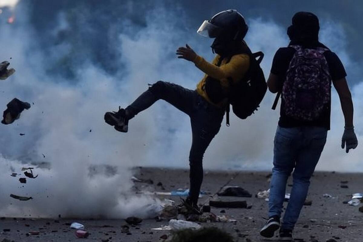 Protestas en Colombia: las imágenes que dejan de los violentos enfrentamientos entre manifestantes y la policía en Cali