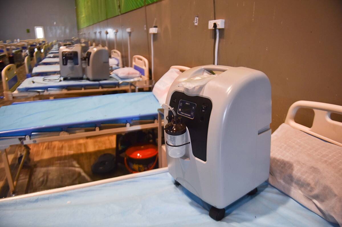 NEW DELHI, INDIA - JULY 26: Oxygen concentrator machines placed on beds at the Commonwealth Games (CWG) Sports Complex Covid-19 Care Centre, in Patparganj, on July 26, 2020 in New Delhi, India. (Photo by Sanchit Khanna/Hindustan Times via Getty Images)