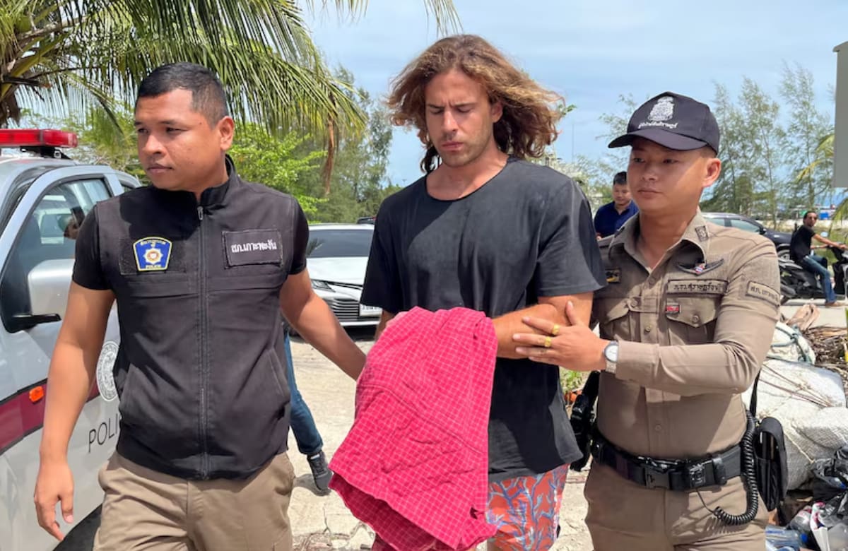 Daniel Sancho Bronchal, the son of Spanish actor Rodolfo Sancho Aguirre is escorted while assisting Thai police with investigations after he was arrested on charges of murder in the death and dismemberment of his Colombian travelling companion Edwin Arrieta Arteaga on the tourist island of Koh Phangan, Thailand August 7, 2023. REUTERS/Stringer