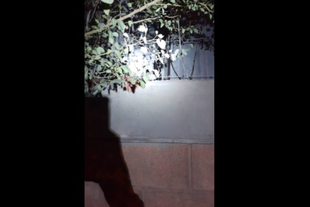 Rescatan a hombre atrapado entre bardas