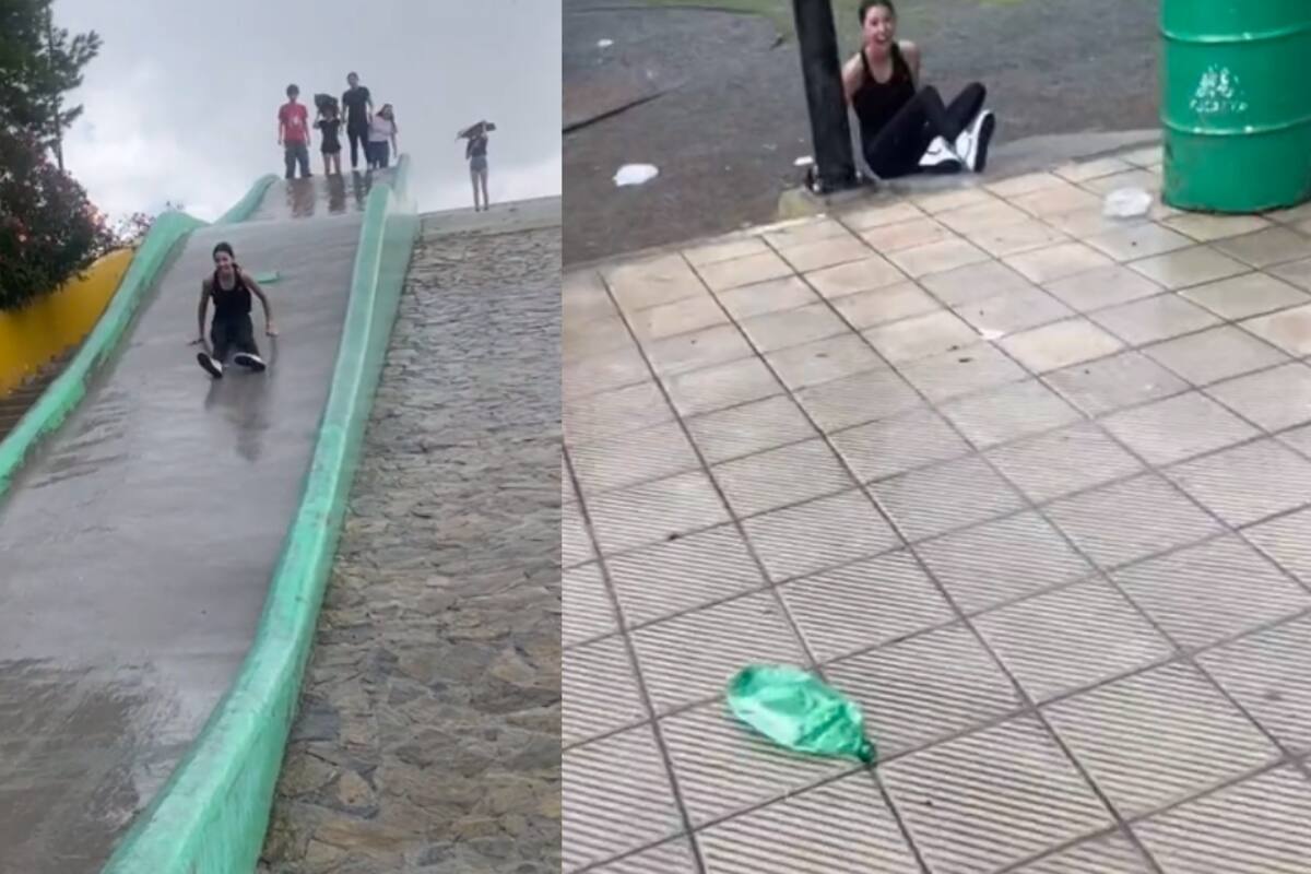 Mujer se tira de una estructura de la calle como si fuera “resbaladilla” y termina deslizándose hasta la mitad de la calle