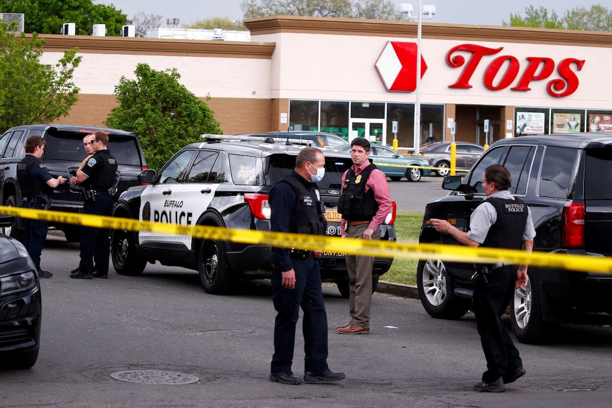 Police officers secure the scene after a shooting at TOPS supermarket in Buffalo, New York, U.S. May 14, 2022. REUTERS/Jeffrey T. Barnes
