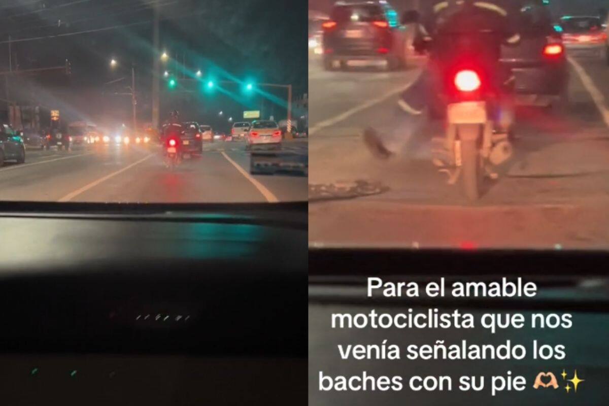 Motociclista les señala los baches con su pie a los conductores que vienen detrás de él y se hace vira