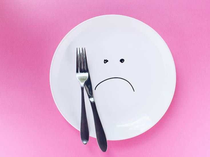 Dile adiós al ‘mal del puerco’: 5 trucos para comer de todo en Navidad sin inflamarte