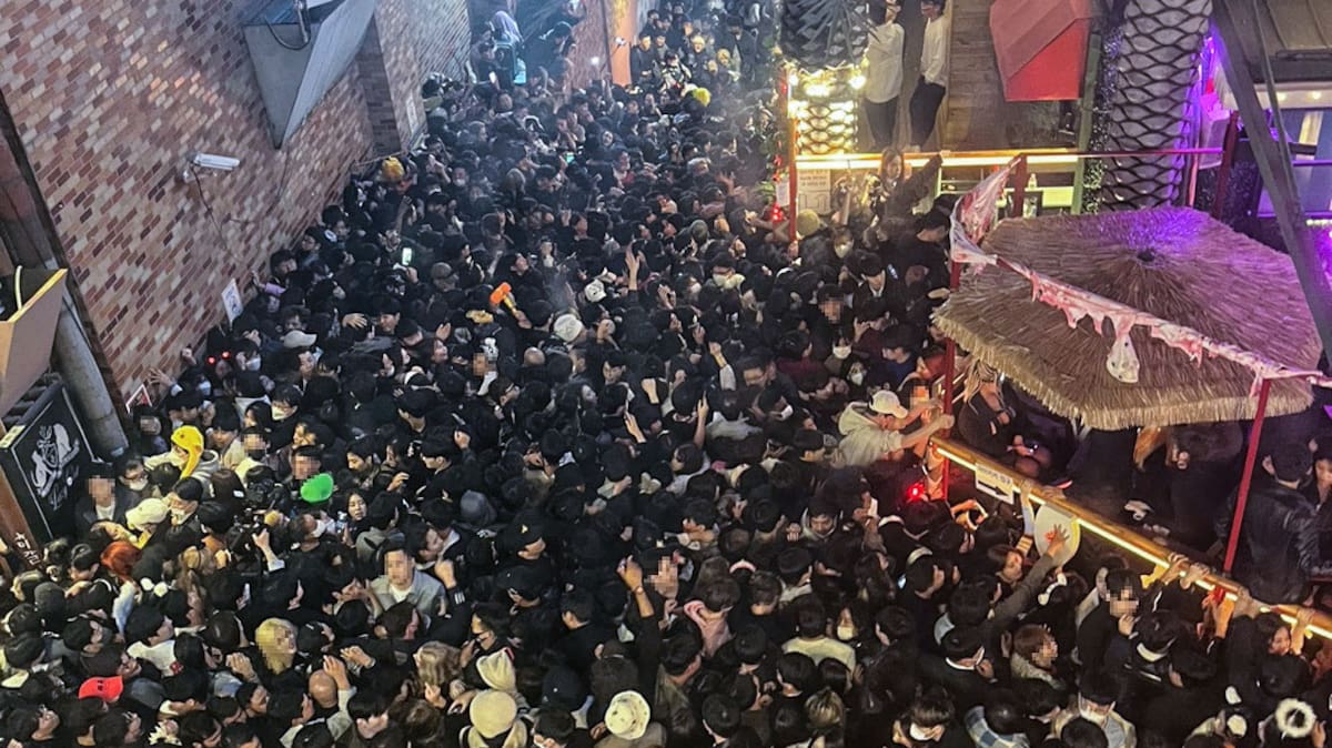 A street in Itaewon district is pictured full of people before a stampede during Halloween festivities killed and injured many in Seoul, South Korea, in this image released by Yonhap on October 30, 2022. Yonhap via REUTERS