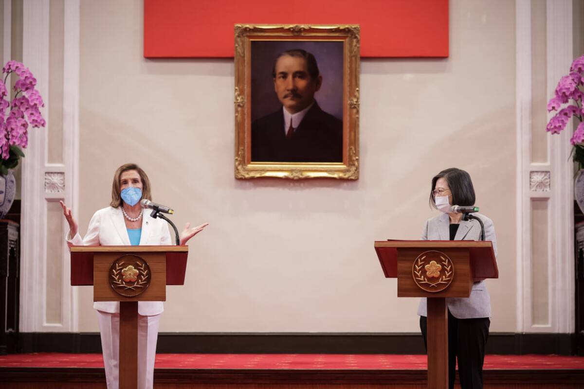TAIPEI, TAIWAN - AUGUST 03: Speaker of the U.S. House Of Representatives Nancy Pelosi (D-CA), left, speaks after receiving the Order of Propitious Clouds with Special Grand Cordon, Taiwan’s highest civilian honour, from Taiwan's President Tsai Ing-wen, right, at the president's office on August 03, 2022 in Taipei, Taiwan. Pelosi arrived in Taiwan on Tuesday as part of a tour of Asia aimed at reassuring allies in the region, as China made it clear that her visit to Taiwan would be seen in a negative light. (Photo by Handout/Getty Images)