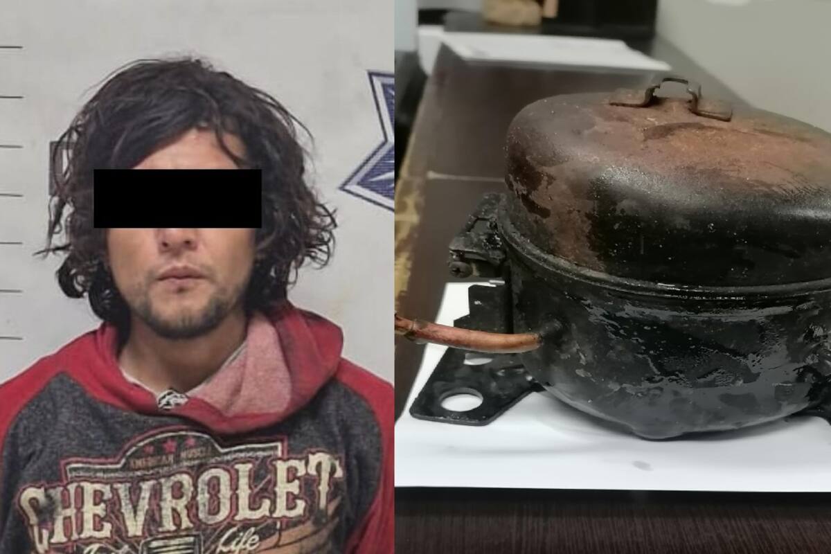 Sorprenden a ladrón desmantelando refrigerador de un bar