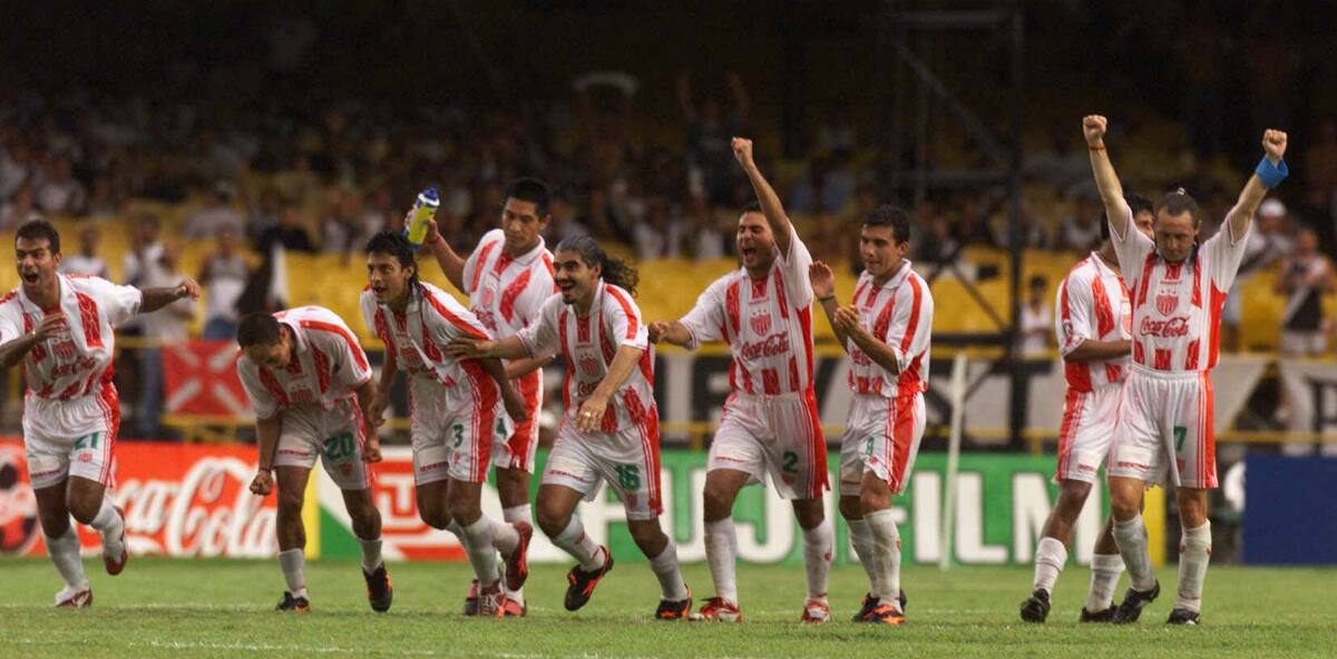 Members of Mexico's Necaxa team celebrate their penalty shoot-out victory over Spain's Real Madrid in a match to decide third place in the First FIFA World Club Championship at the Maracana stadium in Rio de Janeiro, Brazil Friday Jan. 14, 2000. The teams tied 1-1 in regular time but Necaxa won 4-3 in penalty kicks. (AP Photo/Dario Lopez-Mills)