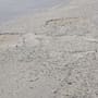Baches en calle Hortencias generan inconformidad