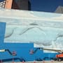 Una demanda de 25 millones de dólares enfrenta a un artista con la FIFA después de que su mural de ballenas, pintado en 1999 y convertido en símbolo de Dallas, fuera cubierto de azul antes del Mundial