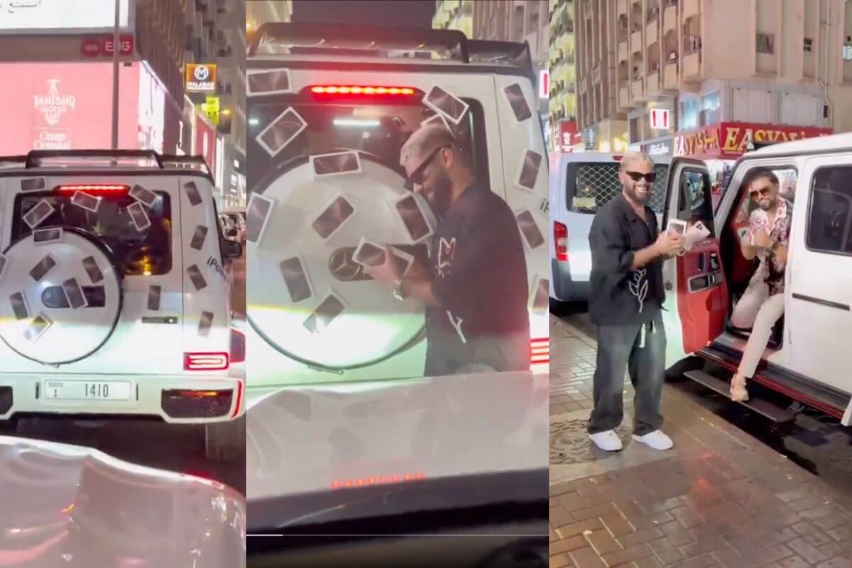 VIRAL | Hombre en Dubái regala iPhone 16 en la calle: ¡los pegó en la parte trasera de su auto!
