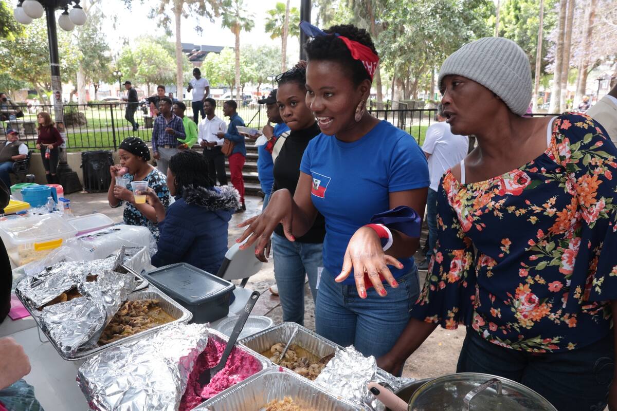 Combina la gastronomía de Haití y activismo para defender a haitianos