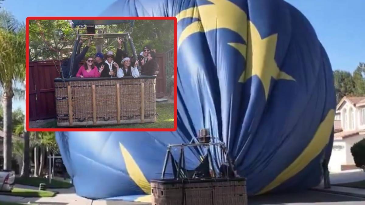 Su esposa estaba haciendo yoga y él viendo televisión cuando un globo aerostático aterrizó en el patio de su casa con 13 personas a bordo; reportaron que no hubo lesionados