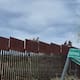 Militares estadounidenses refuerzan el muro fronterizo en Nogales; van 22 kilómetros de alambre de púas colocados en la frontera de Sonora