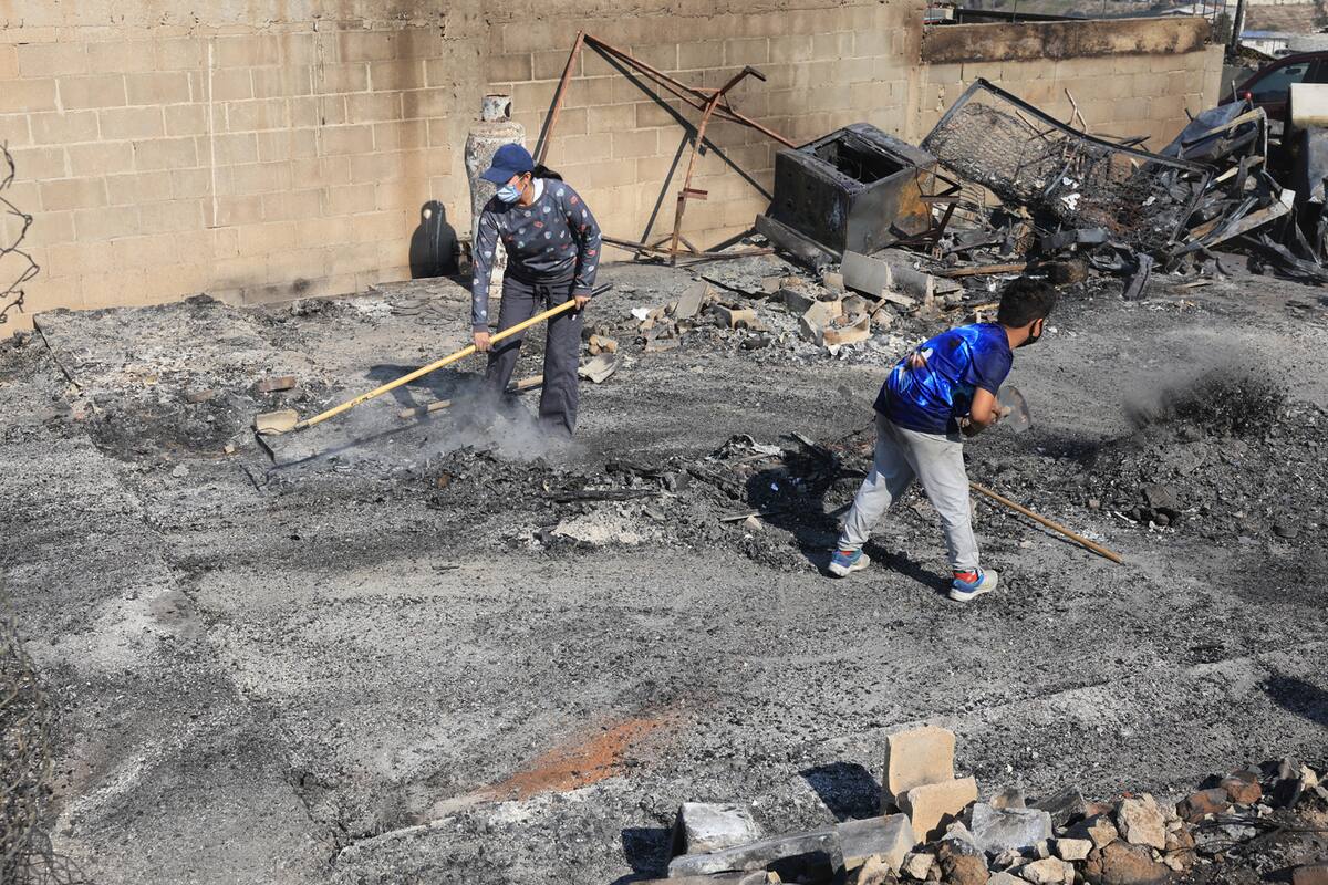 Inician la reconstrucción de sus casas en la Leandro Valle