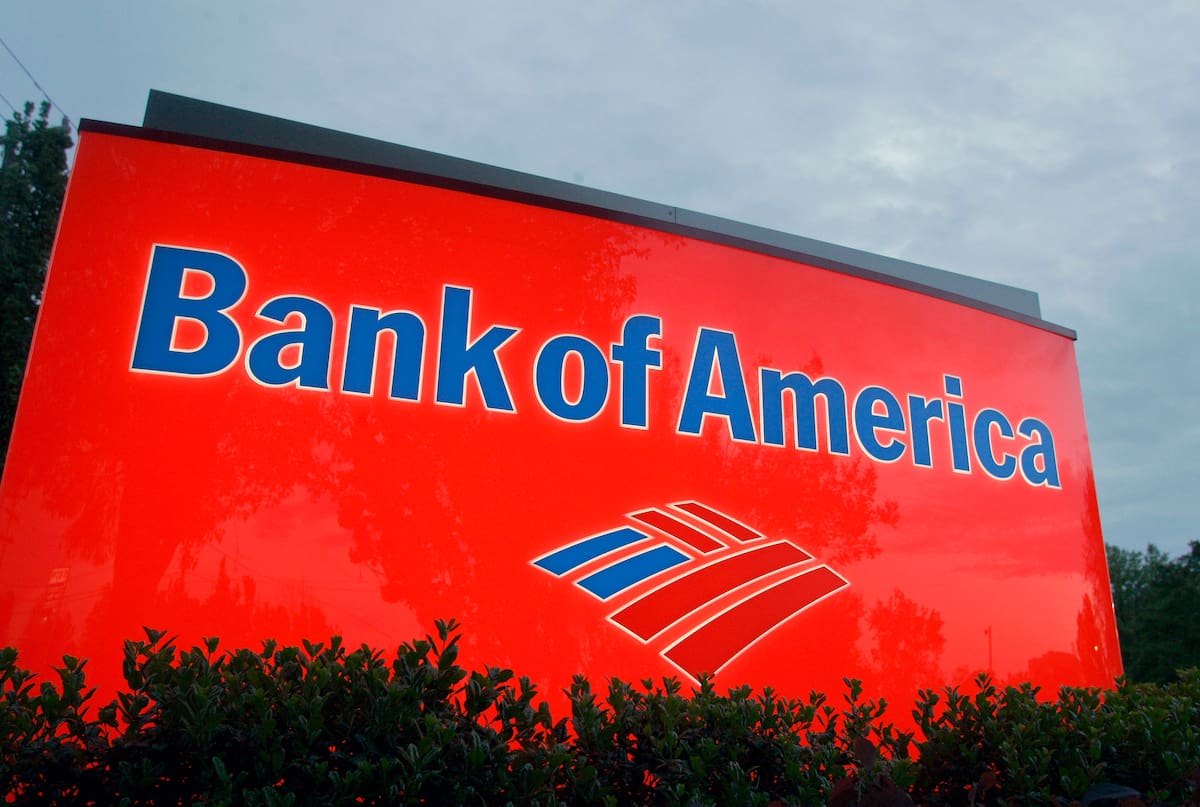 FILE - In this April 21, 2008 file photo, a sign for a Bank of America branch is shown in Charlotte, N.C. Bank of America says it will no longer process transactions for the website WikiLeaks, following similar actions by several other financial institutions. (AP Photo/Chuck Burton, File)