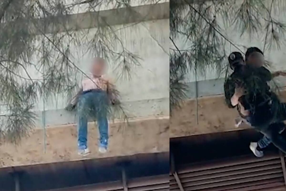 VIDEO: Policía de CDMX salva a joven que intentó lanzarse de un puente peatonal y resulta lesionado