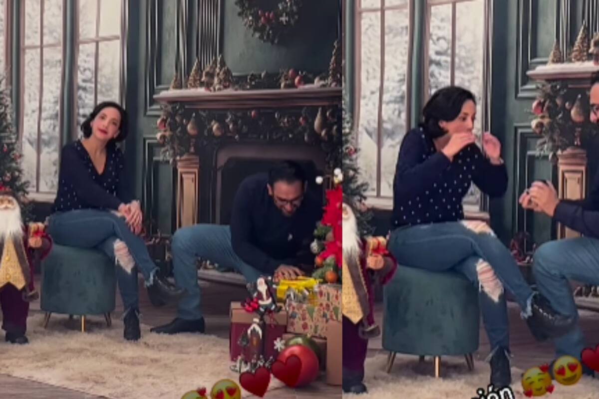 Hombre sorprende a su novia con una propuesta de matrimonio durante sesión navideña