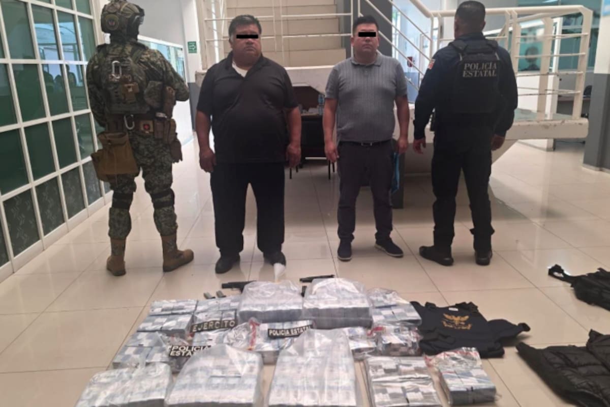 Detienen en Edomex a dos hombres con 37,000,000 de pesos y armas de fuego en camioneta blindada