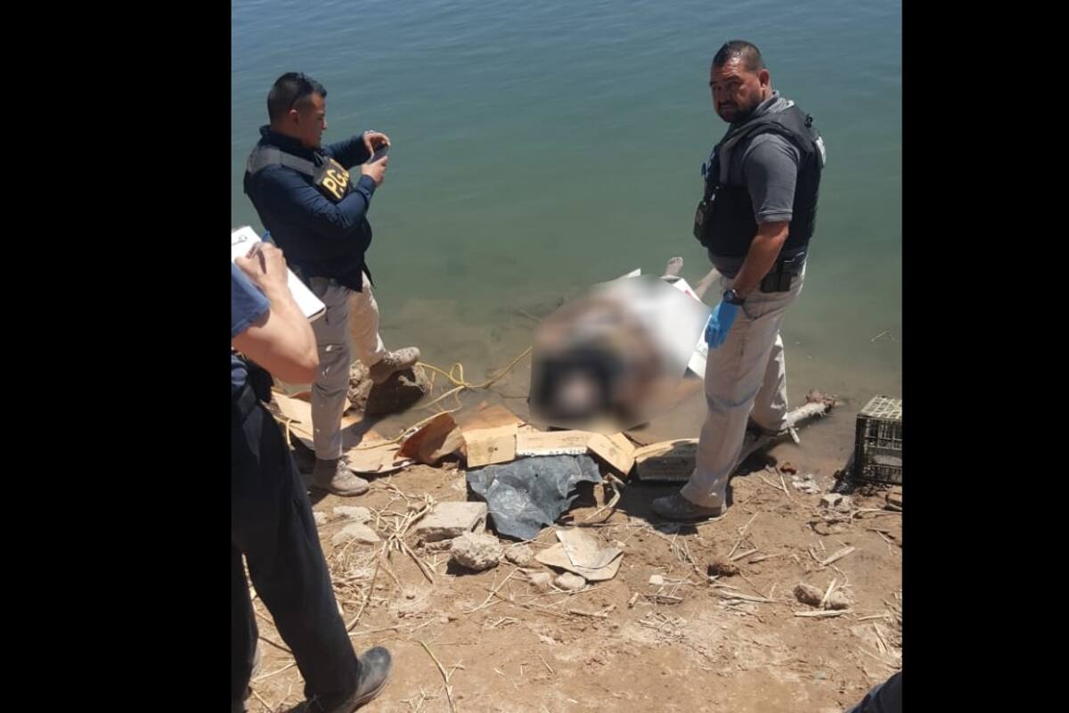 Descubren cadáver en la presa Morelos