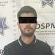 Detienen a joven con pistola tras manejar a exceso de velocidad